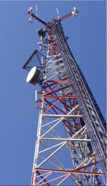 view from the bottom of a telecom tower looking up